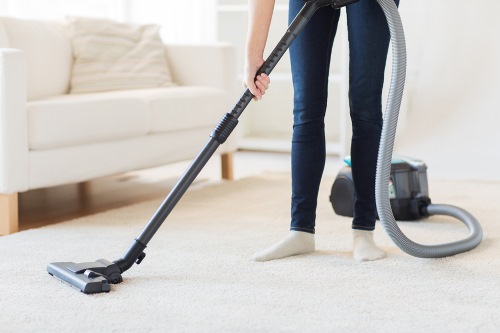 Residential Cleaning in Oscar LA - vacuuming carpets